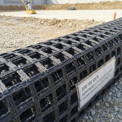 200-100 Kn/M Reinforced PET Polyester Geogrid For Foundation And Subgrade Stability