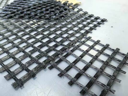 Elongation less than or equal to 13 percent Polyester Geogrid Mesh Size 50.8 by 50.8 or 25.4 by 25.4 Ideal for Ground Stabilization Projects