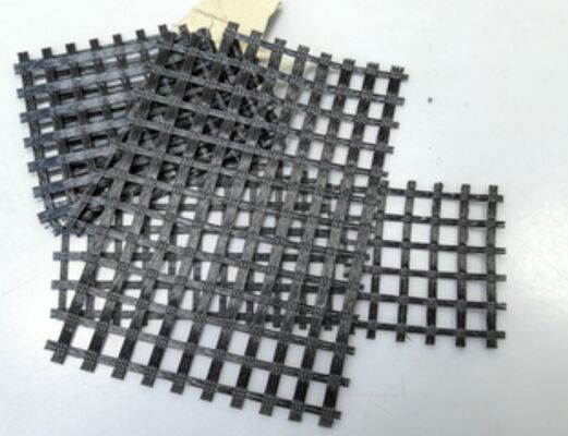 Good price Elongation less than or equal to 13 percent woven polyester geogrid offering long term stability resistance to creep ideal for soil reinforcement applications online